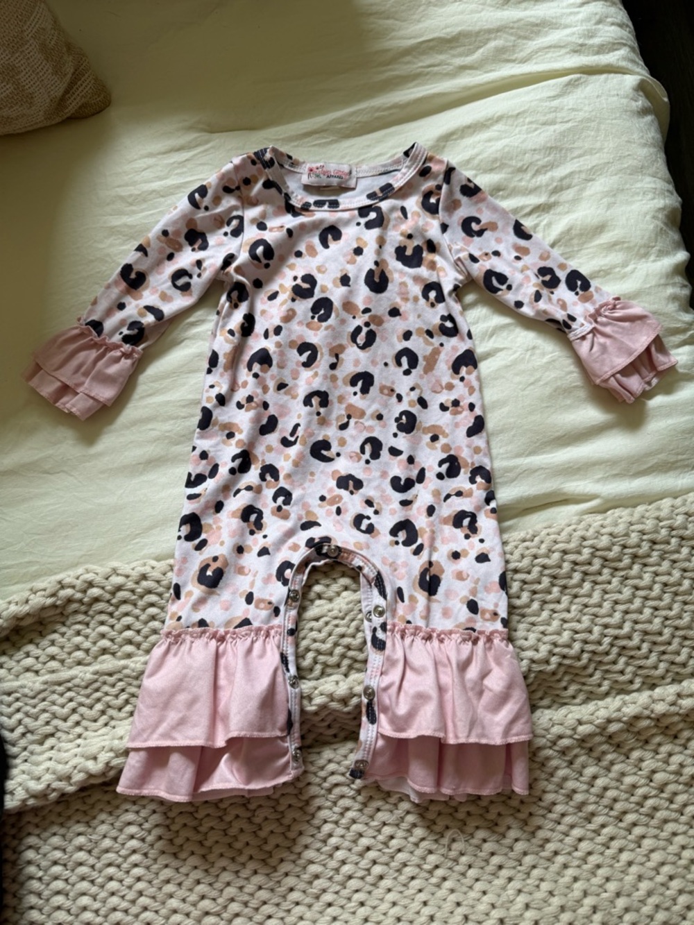 Girls Leopard Ruffle Romper - Pink and Black 0-6m